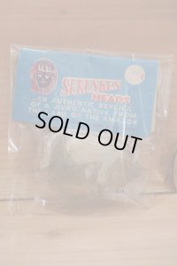 SHRUNKEN HEADS