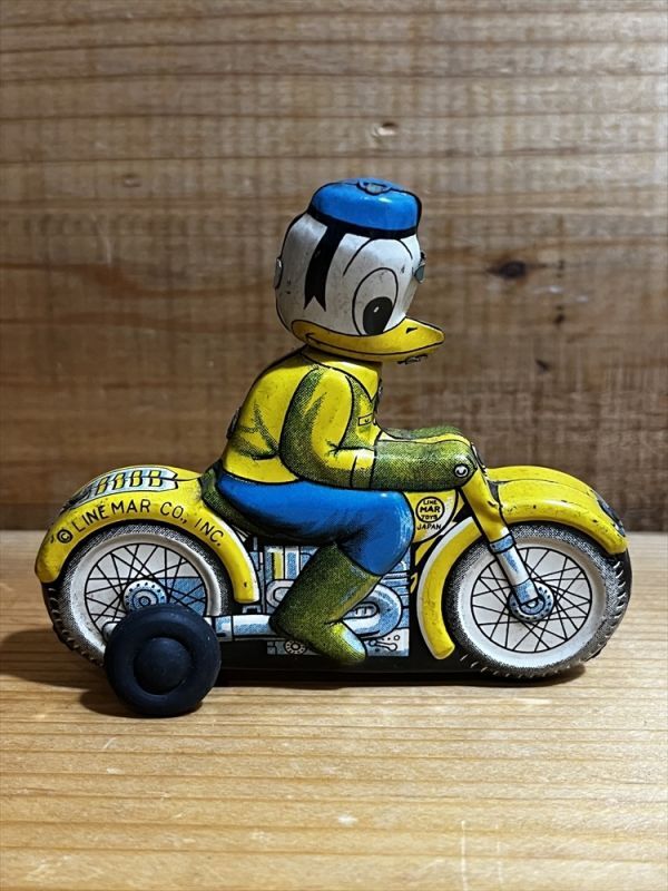 画像: Donald Duck Friction Motorbike