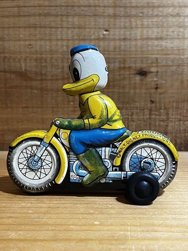 画像: Donald Duck Friction Motorbike